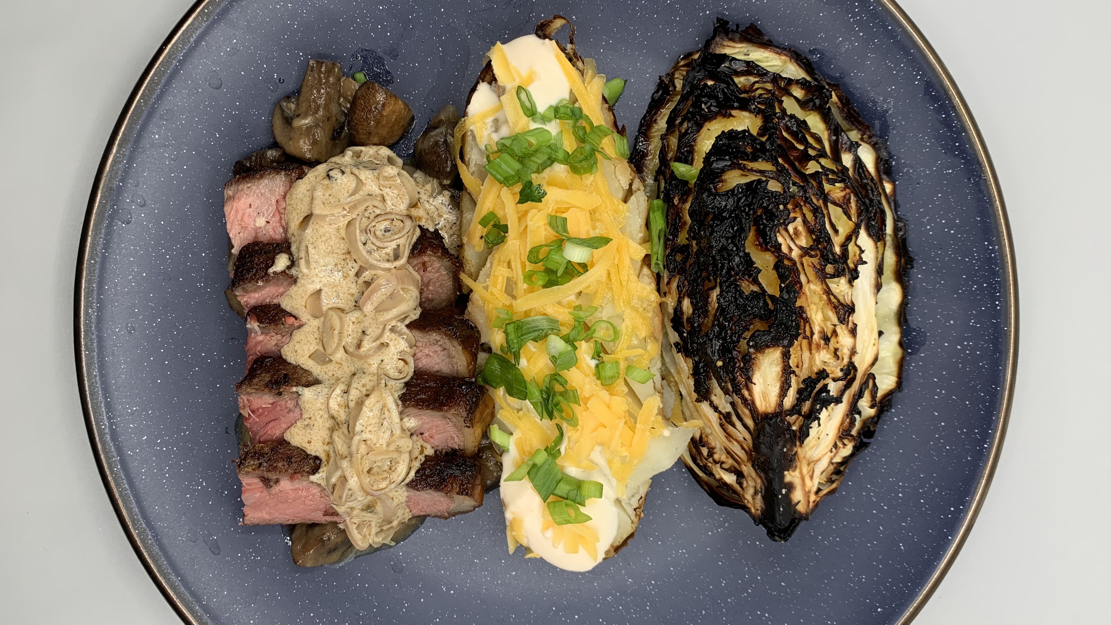 Steak Au Poivre, Loaded Baked Potato, Roasted Tahini Cabbage