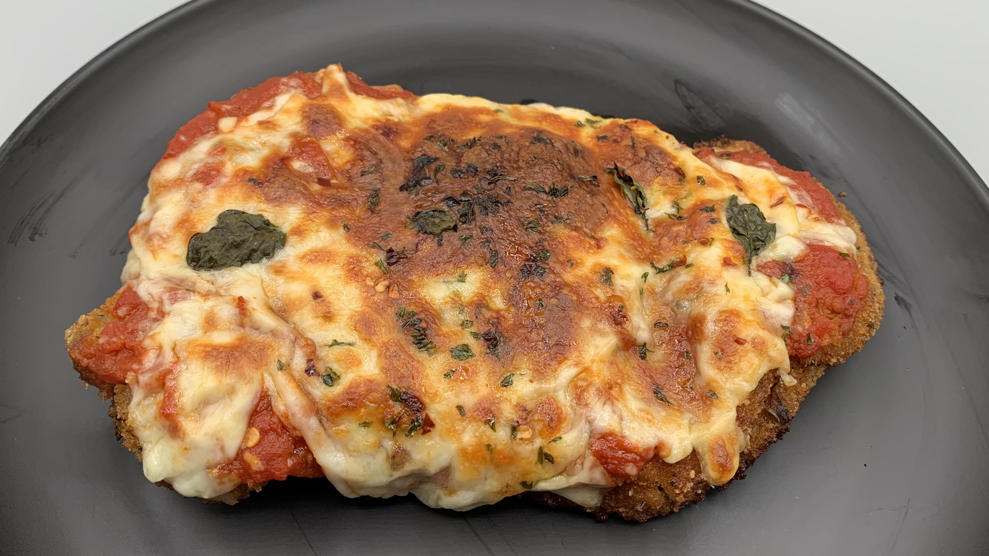 Hand-Breaded Pork Chop Parmesan